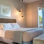 아파트호텔 Beachfront Suites Lourdas 로우드하타